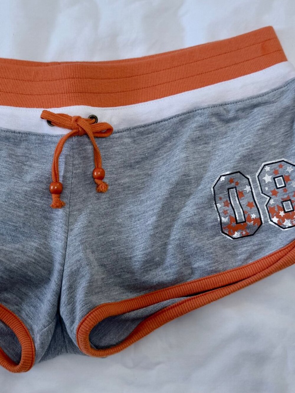 BRAND NEW (TAGS ATTACHED) Y2K SELF ESTEEM JUNIOR GRAY/ORANGE SHORT SHORTS - M B